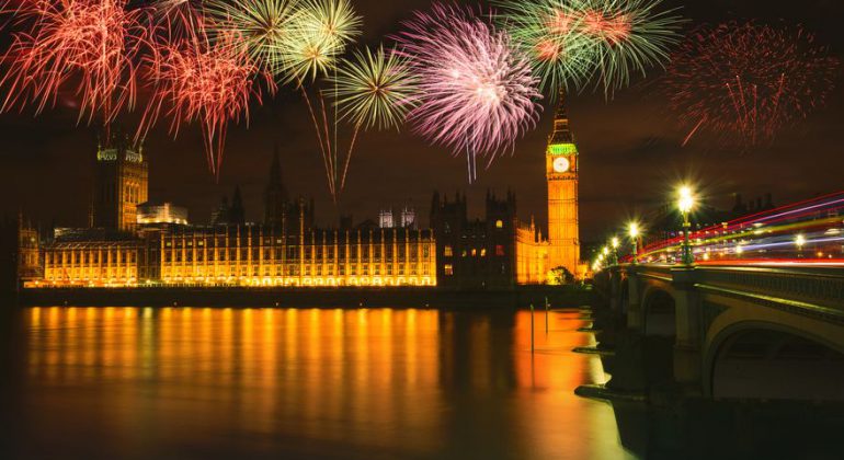 fireworks over big ben tower during night