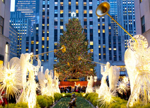 New York City, NY, United States of America, December 8, 2014: Taken from 5th Avenue, a shot of the 2014 Rockefeller Center Christmas Tree.