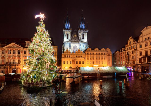 Prague old town square in Christmas decorations at night.