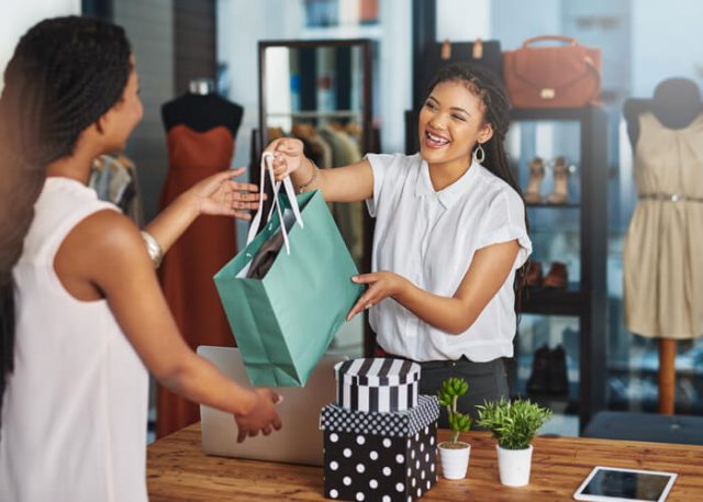 women happy to buy and save on shopping