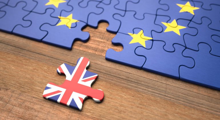 Brexit: United Kingdom leaving the European Union represented in puzzle pieces.